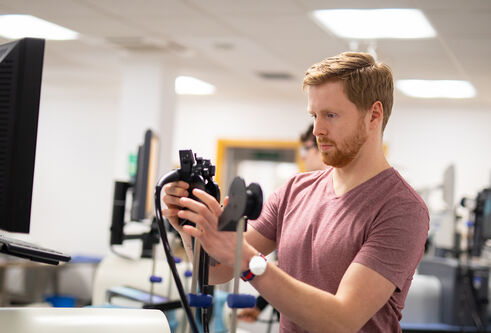 A student working with biomedical technology 