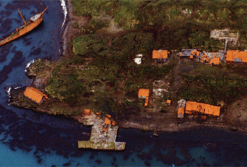 a satellite image of a coastal village 