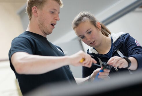 Mechanical Engineering students in a lab
