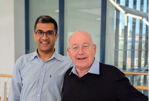 Arpan Mehta and Philip Cohen stood next to each other smiling