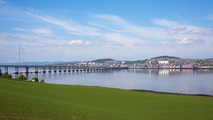 A view of Dundee from Tayport, a village over the River, with the Tay Road Bridge to the left