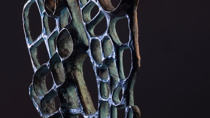 Metal sculpture showcasing intricate design and craftsmanship