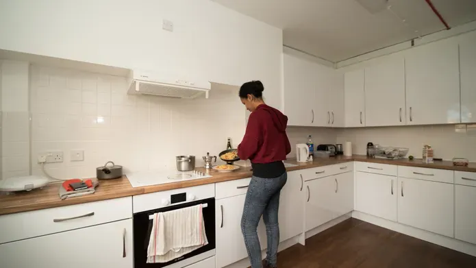Student in kitchen