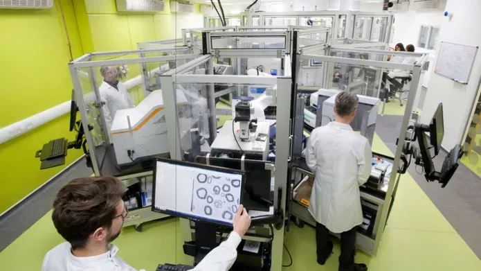 Researchers in lab