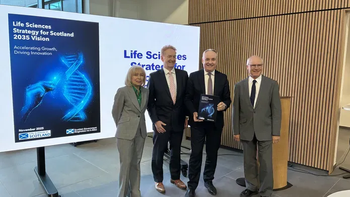 Representatives of the University and Scottish Government with the launch document