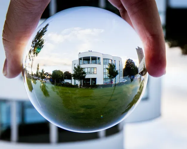 White building in glass sphere