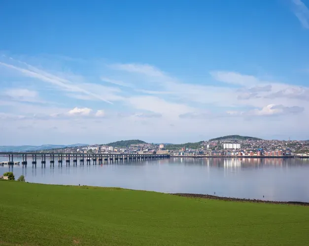 A view of Dundee from Tayport, a village over the River, with the Tay Road Bridge to the left