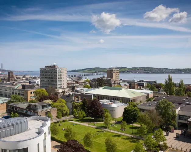 The campus green from the top of Belmont Tower. Looking over the city to the river Tay.