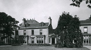 an image of some houses with trees